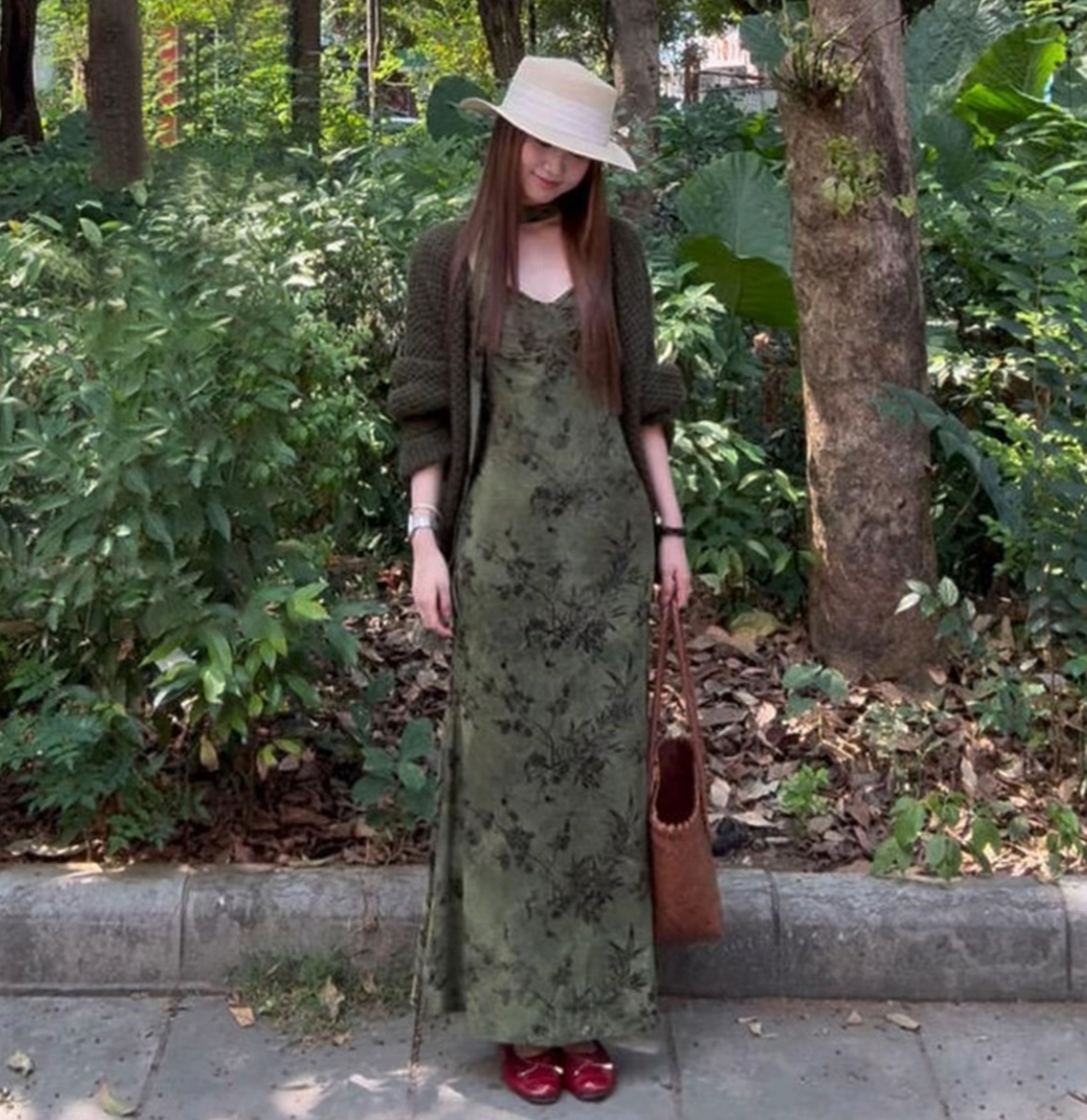 The pea green rose-patterned long dress exudes a sense of elegance and fashion