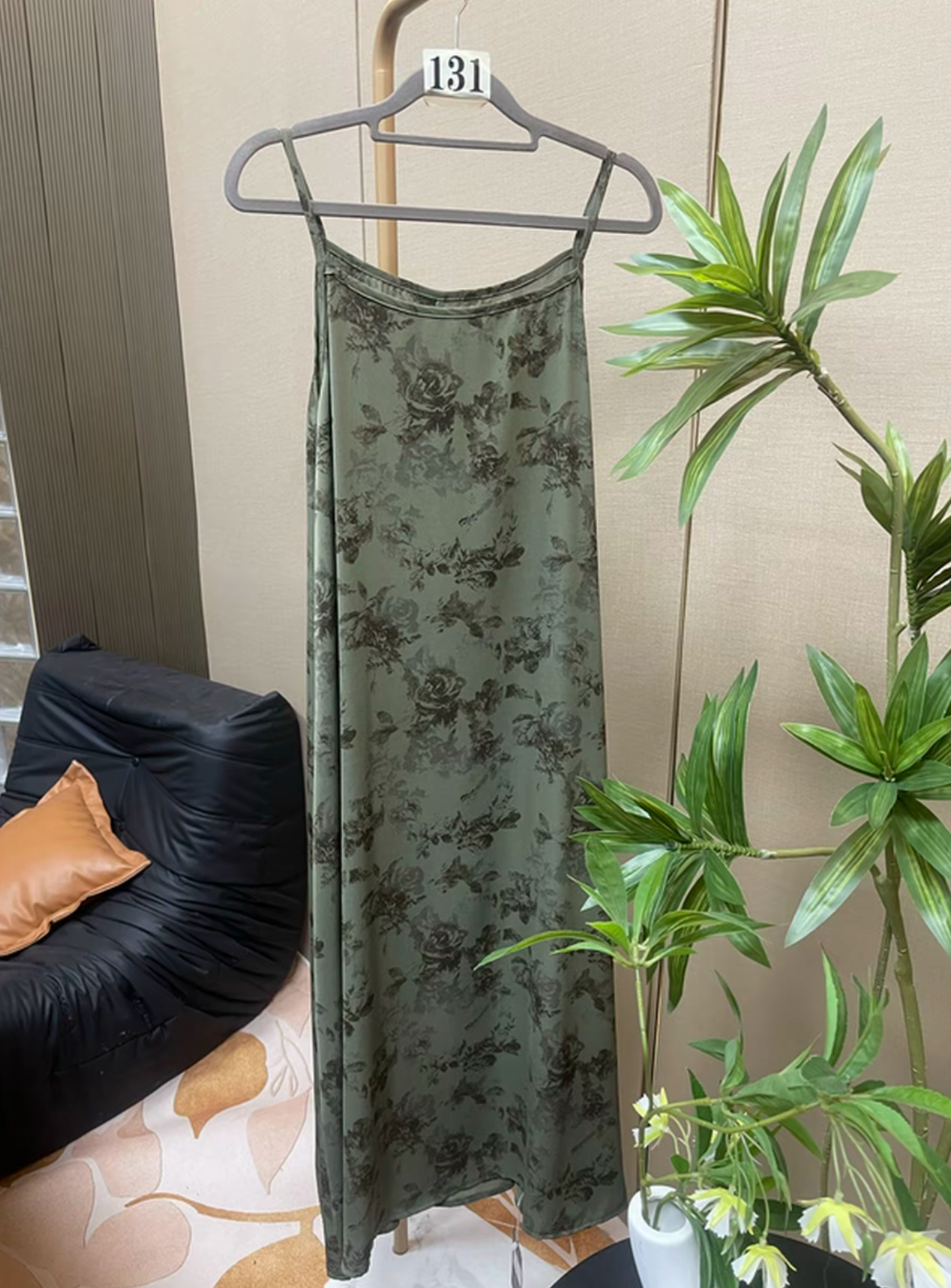The pea green rose-patterned long dress exudes a sense of elegance and fashion